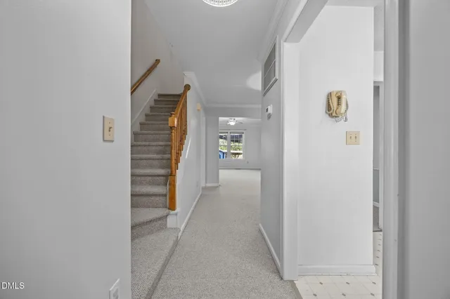 a view of a house with furniture and a fire pit