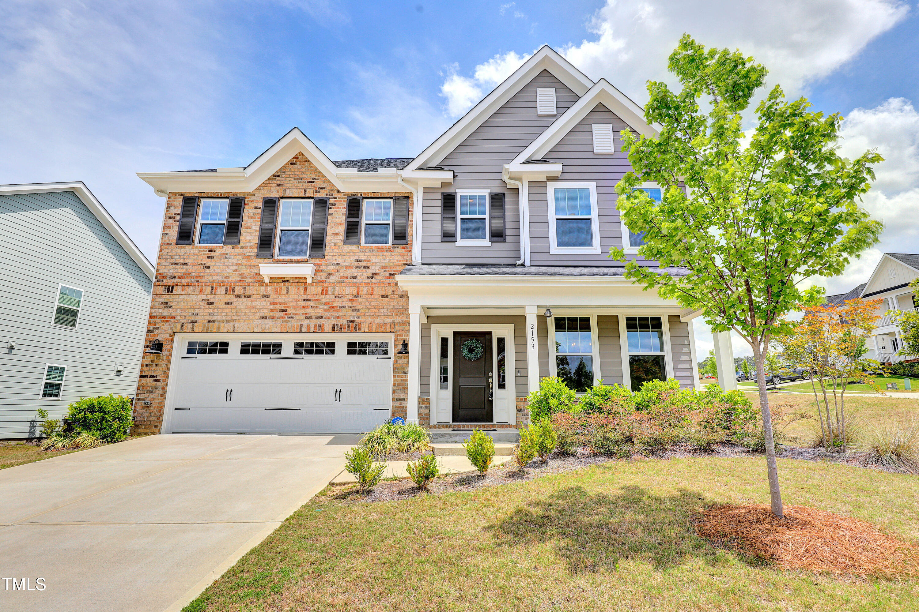2153 Sweet Samson Street Wake Forest, NC 27587 - Photo 1 of 47 a view of a house with a yard and potted plants