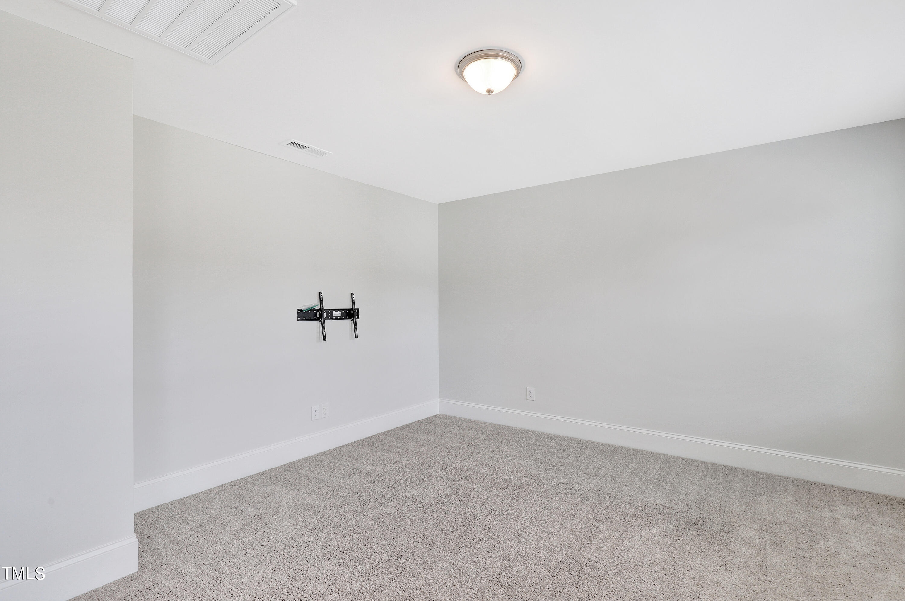 2153 Sweet Samson Street Wake Forest, NC 27587 - Photo 18 of 47 a view of an empty room