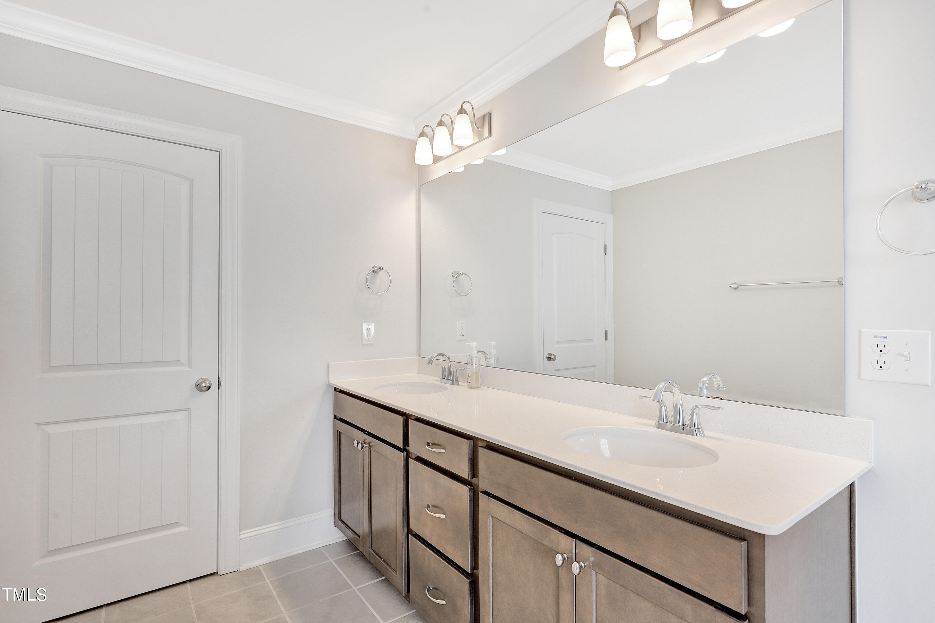 2153 Sweet Samson Street Wake Forest, NC 27587 - Photo 24 of 47 a bathroom with a sink vanity and a mirror