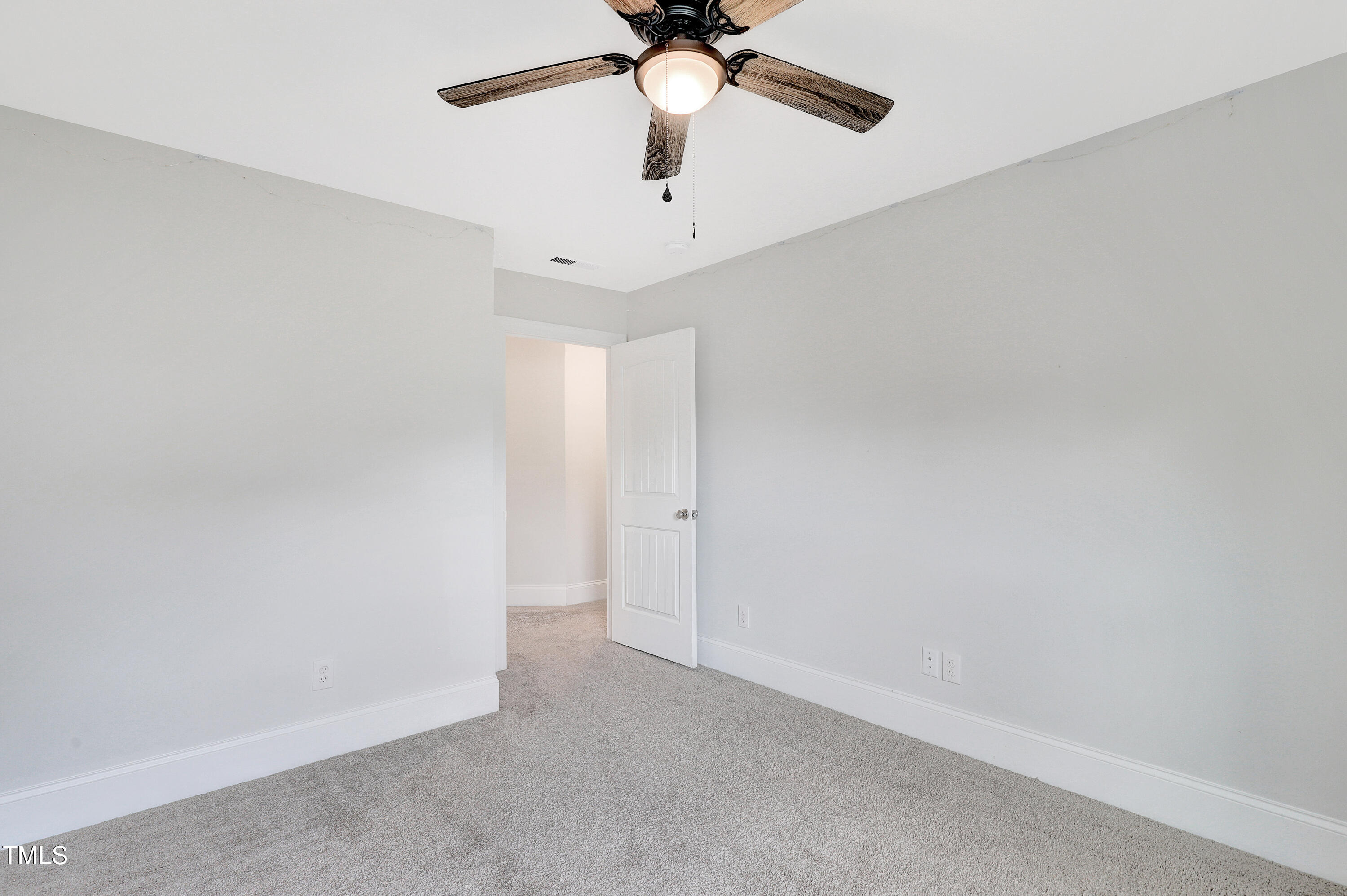 2153 Sweet Samson Street Wake Forest, NC 27587 - Photo 33 of 47 a view of a chandelier fan in a room