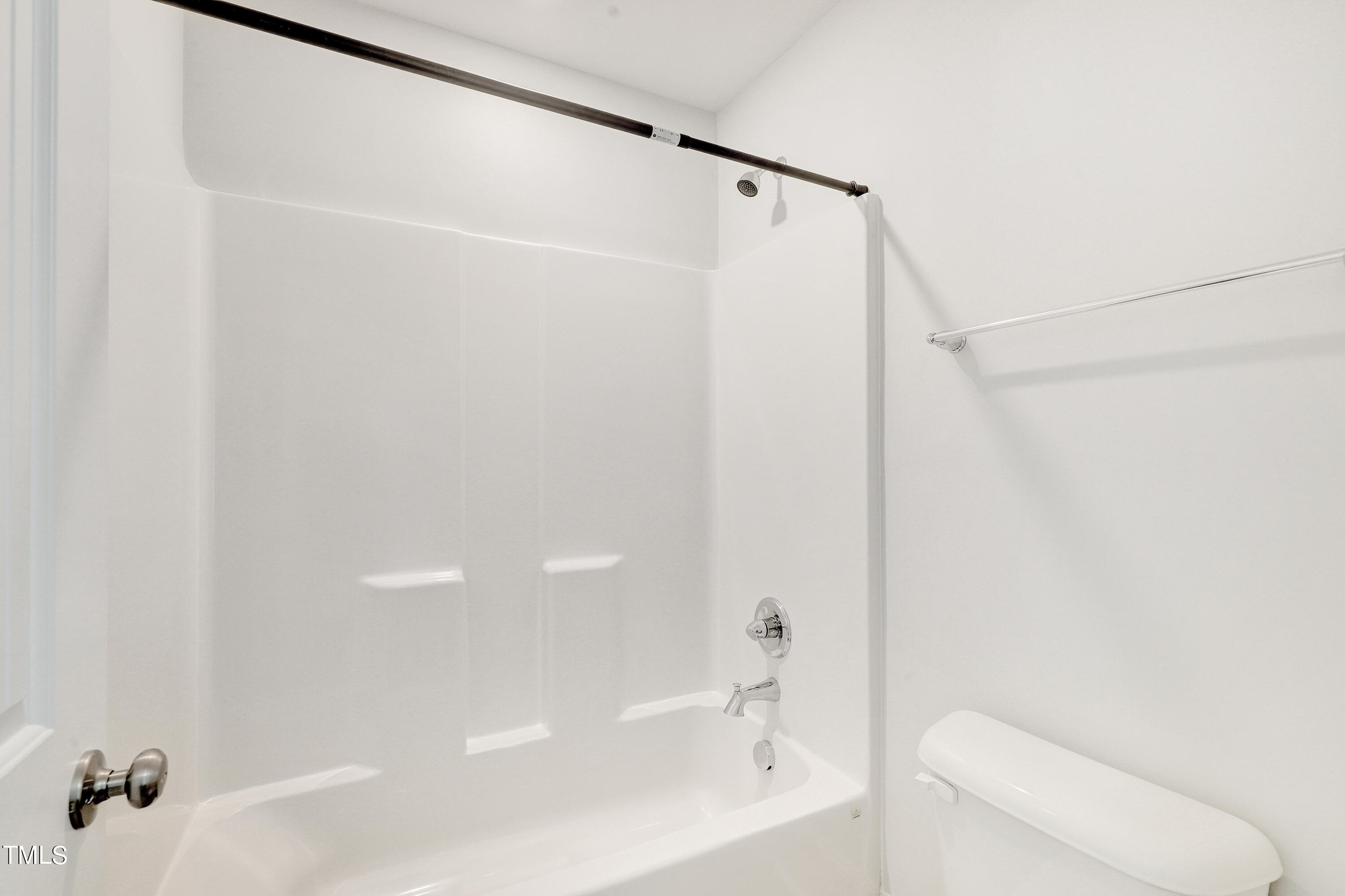 2153 Sweet Samson Street Wake Forest, NC 27587 - Photo 35 of 47 a bathroom with a shower and a toilet