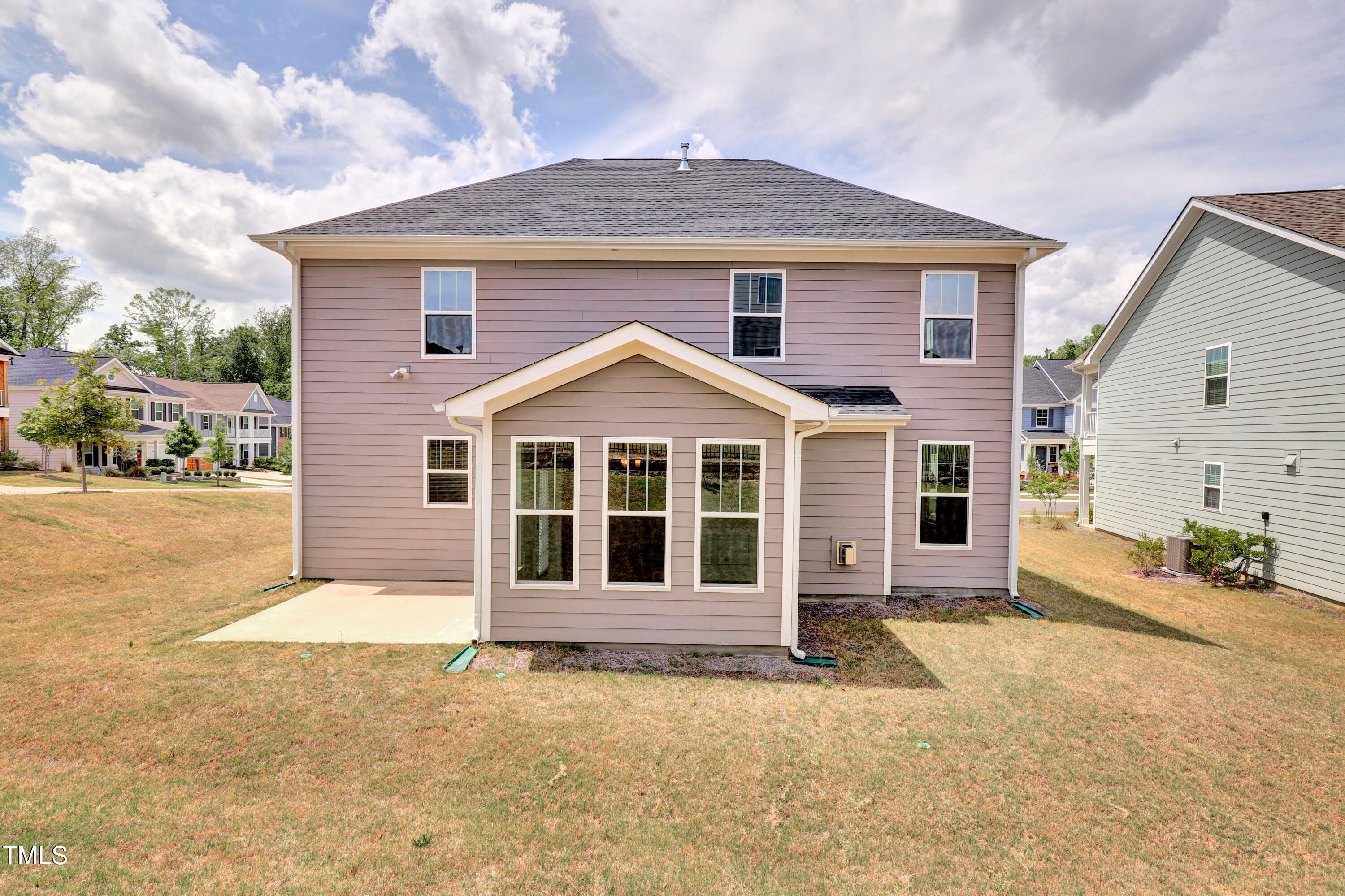 2153 Sweet Samson Street Wake Forest, NC 27587 - Photo 36 of 47 a front view of a house with a garage