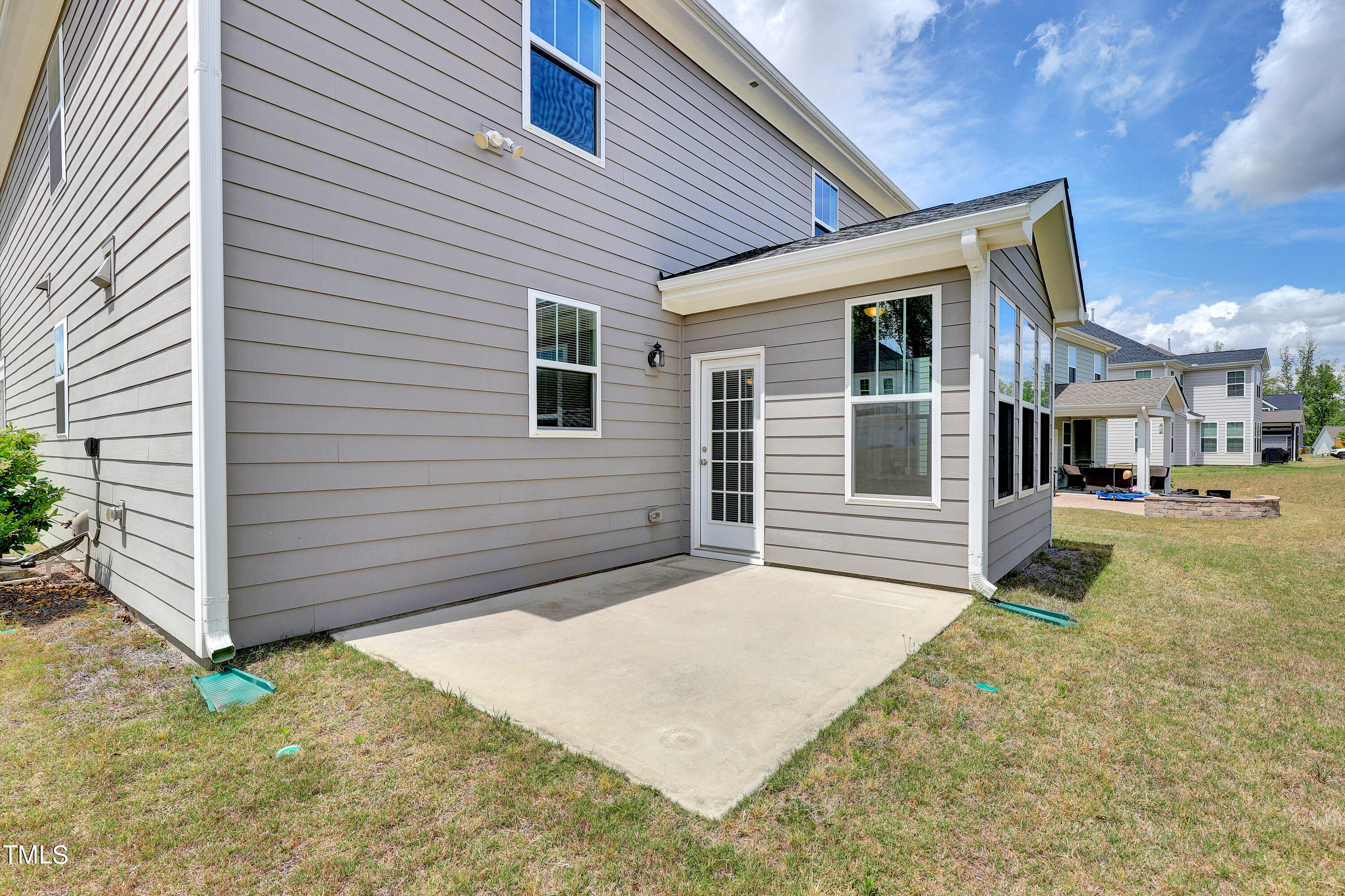 2153 Sweet Samson Street Wake Forest, NC 27587 - Photo 38 of 47 a front view of a house with a yard and garage