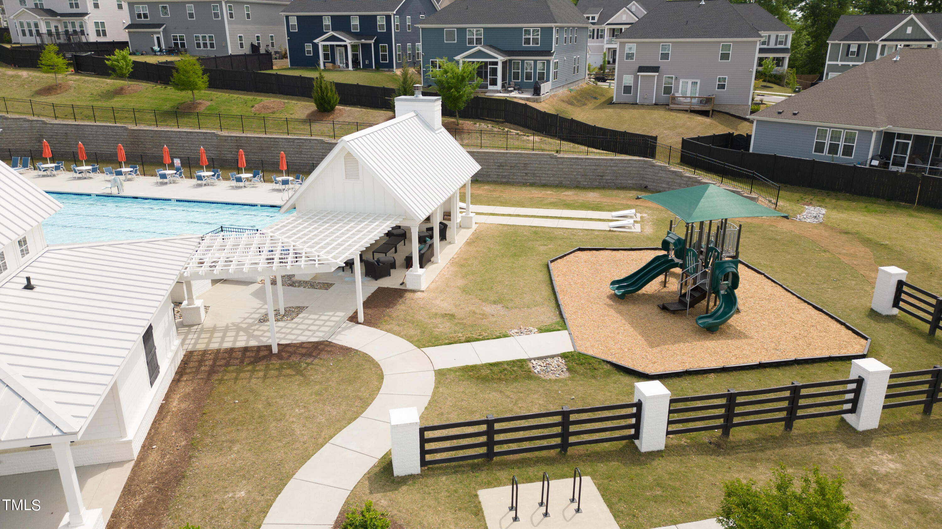 2153 Sweet Samson Street Wake Forest, NC 27587 - Photo 41 of 47 a view of a patio with couches table and chairs