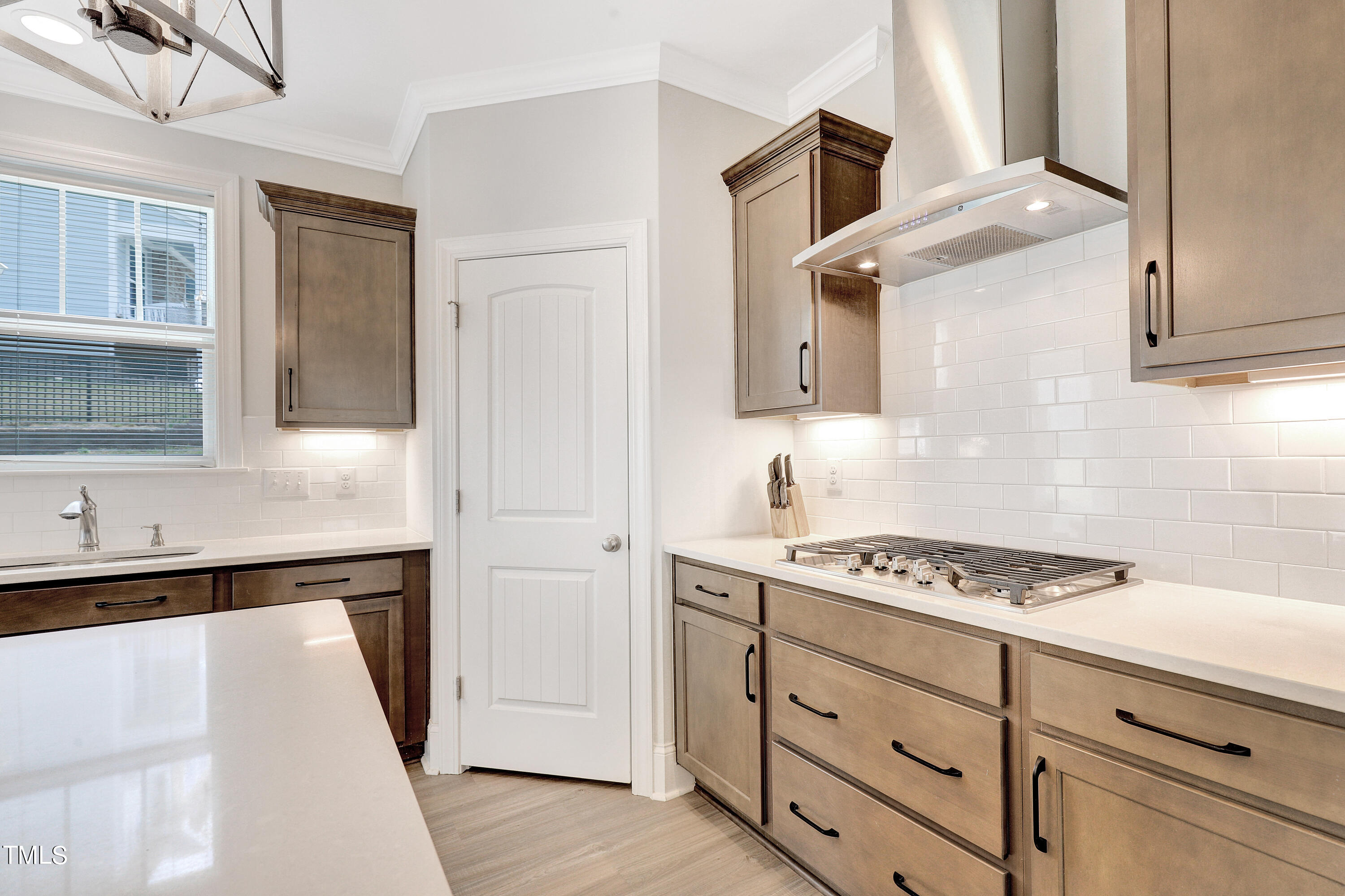 2153 Sweet Samson Street Wake Forest, NC 27587 - Photo 9 of 47 a kitchen with cabinets and appliances