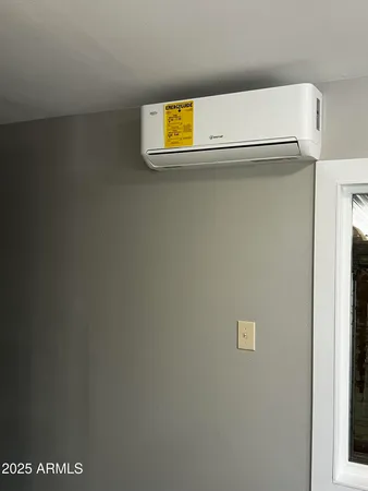 a kitchen with sink refrigerator and window