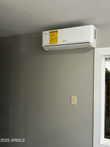 a kitchen with sink refrigerator and window