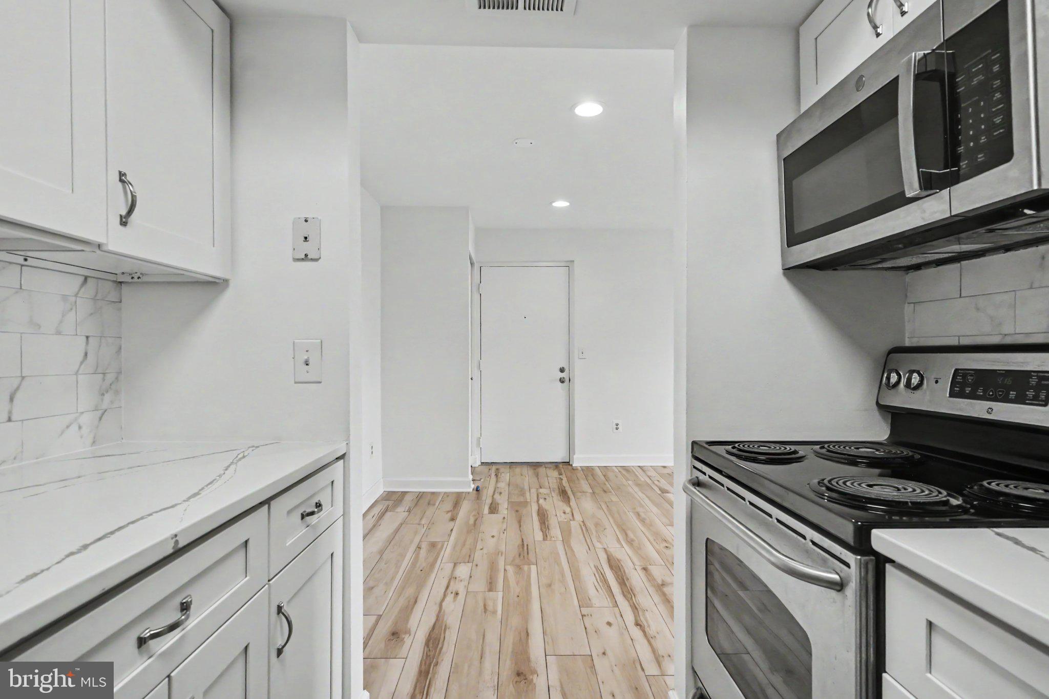 Modern kitchen with sleek finishes.