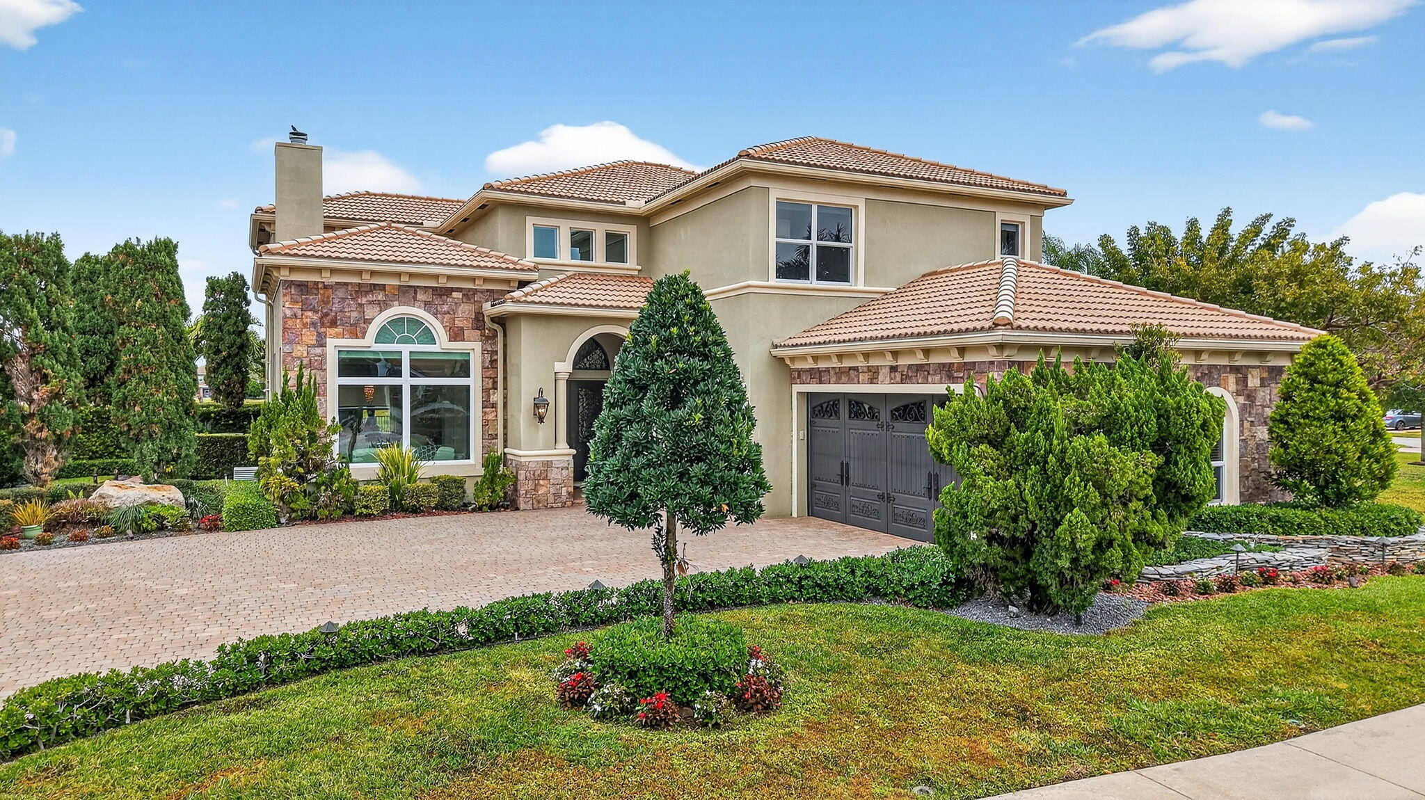 8859 Cobblestone Point Circle Boynton Beach, FL 33472 - Photo 2 of 147 1-web-or-mls-DJI_20260205103508_0112_D