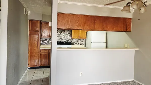 a view of walk in closet with window