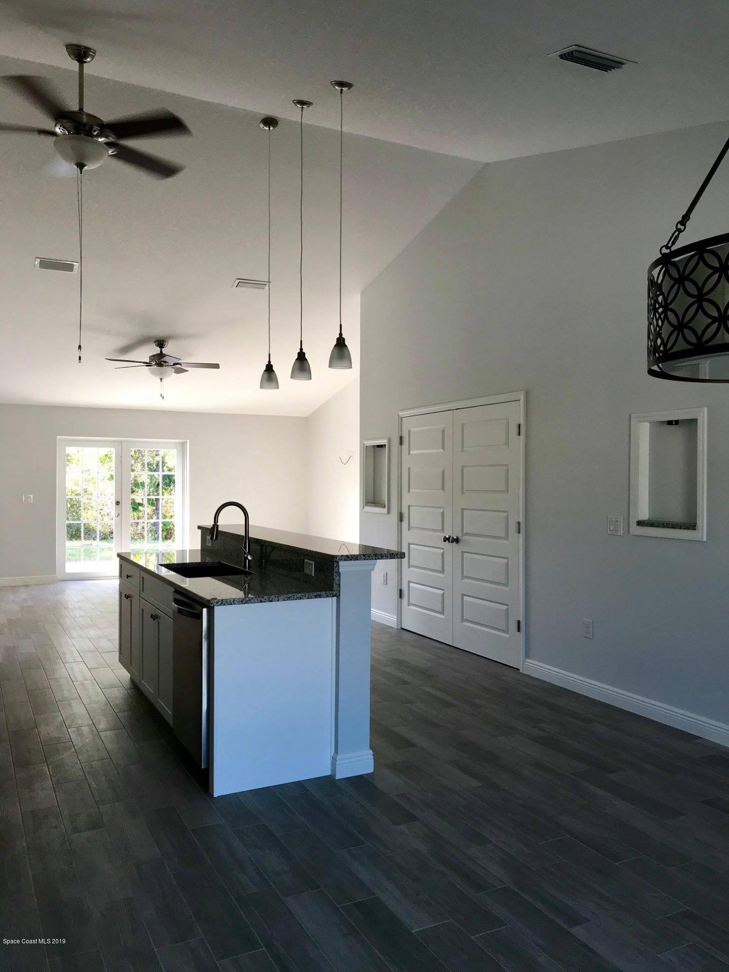 6941 Bismark Road Cocoa, FL 32927 - Photo 4 of 10 IMG_2374 2