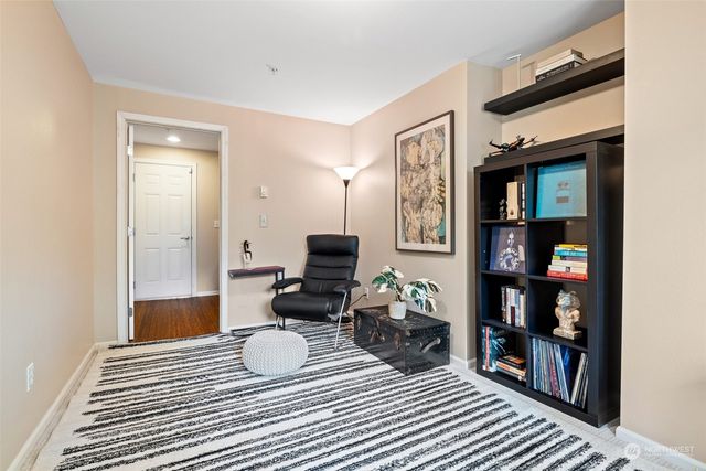 a workspace with furniture and a window