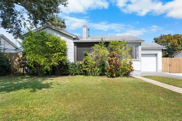 a view of a garden with a fountain
