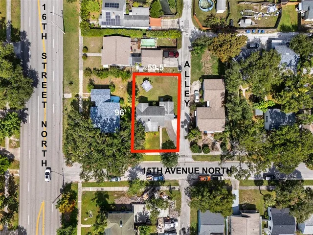 an aerial view of a house with swimming pool