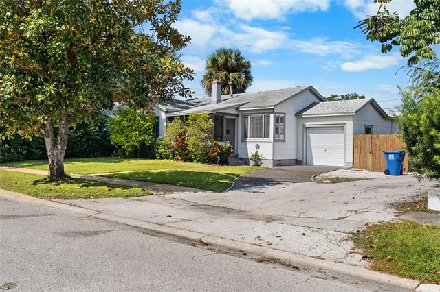 an aerial view of a swimming pool with outdoor space