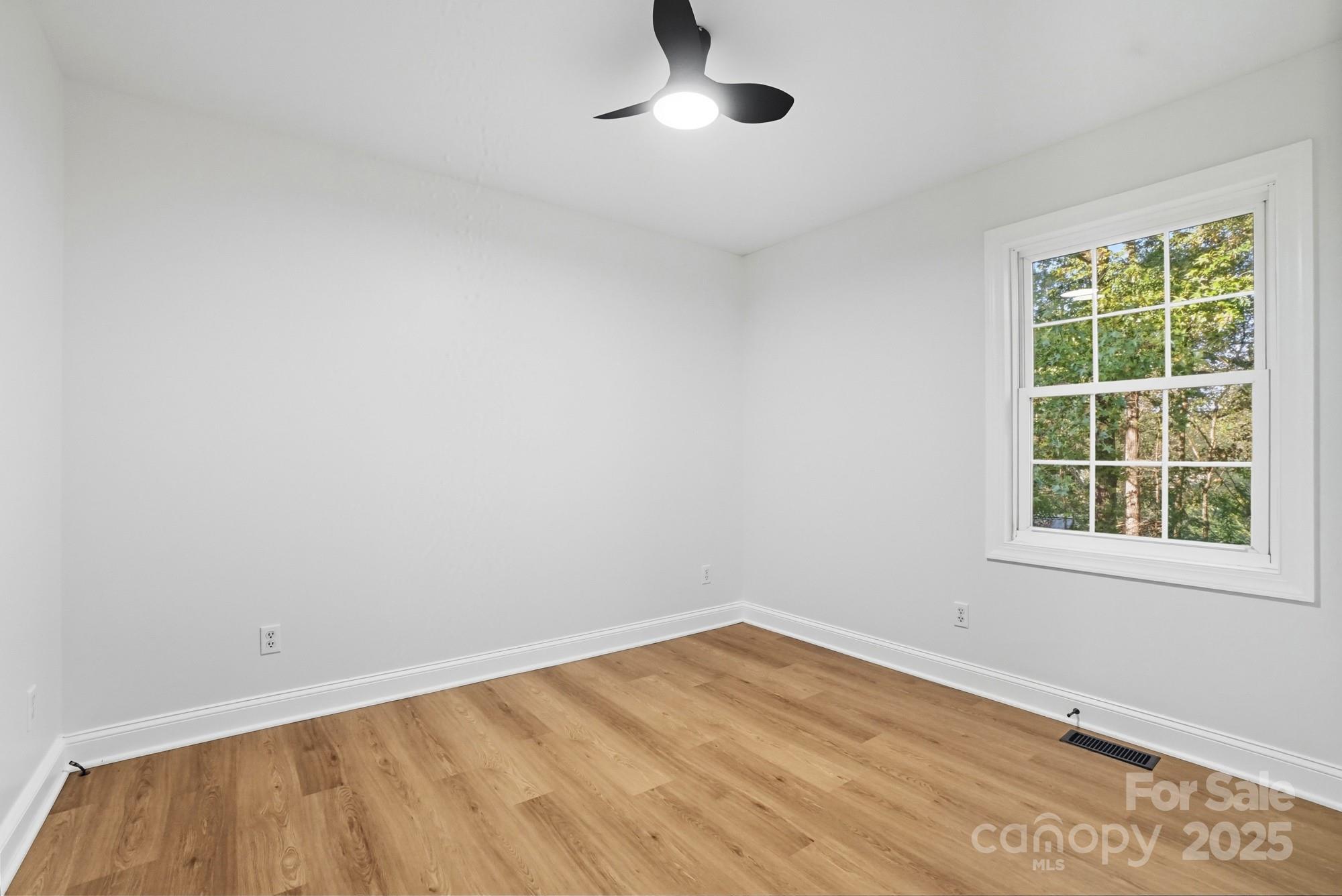 324 West Shiloh Unity Road Lancaster, SC 29720 - Photo 16 of 28 an empty room with a window