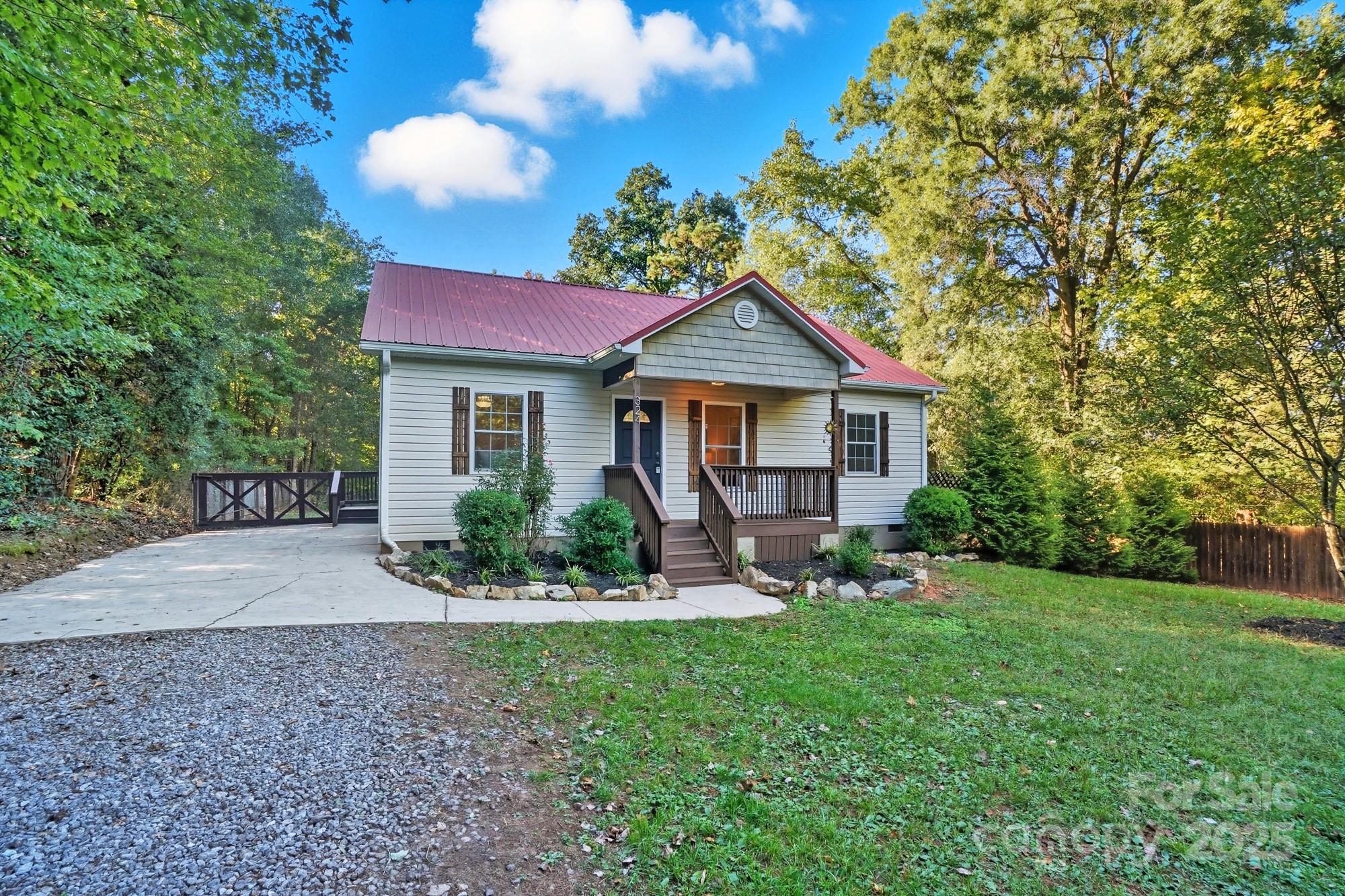 324 West Shiloh Unity Road Lancaster, SC 29720 - Photo 2 of 28 a front view of a house with garden