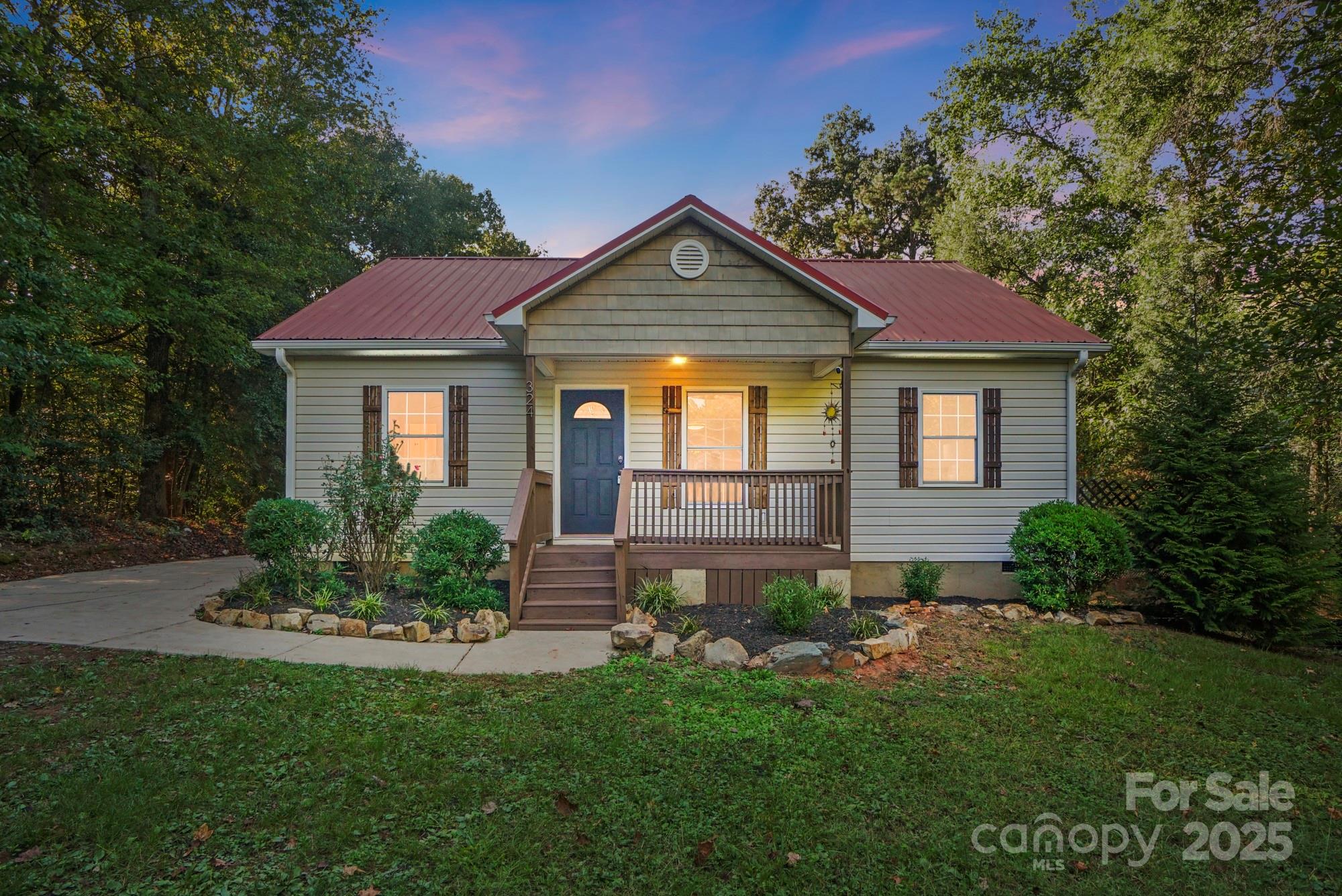 324 West Shiloh Unity Road Lancaster, SC 29720 - Photo 28 of 28 a front view of a house with a yard