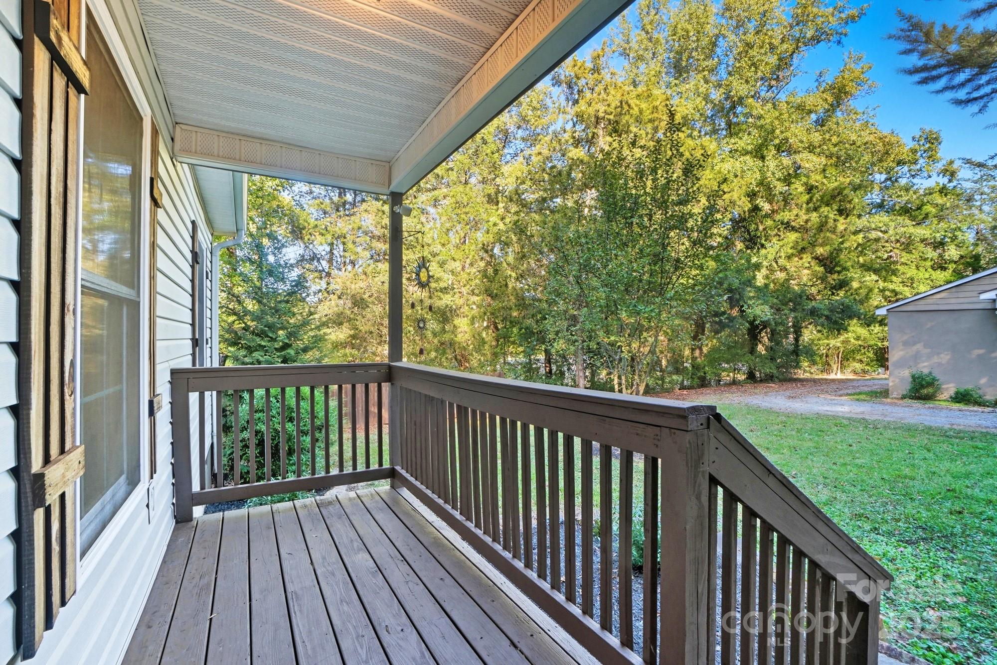 324 West Shiloh Unity Road Lancaster, SC 29720 - Photo 4 of 28 a view of balcony with wooden floor and fence
