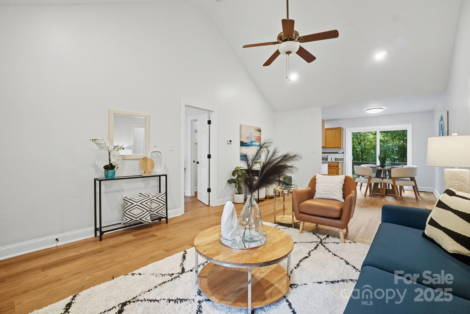 324 West Shiloh Unity Road Lancaster, SC 29720 - Photo 7 of 28 a living room with furniture and a dining table