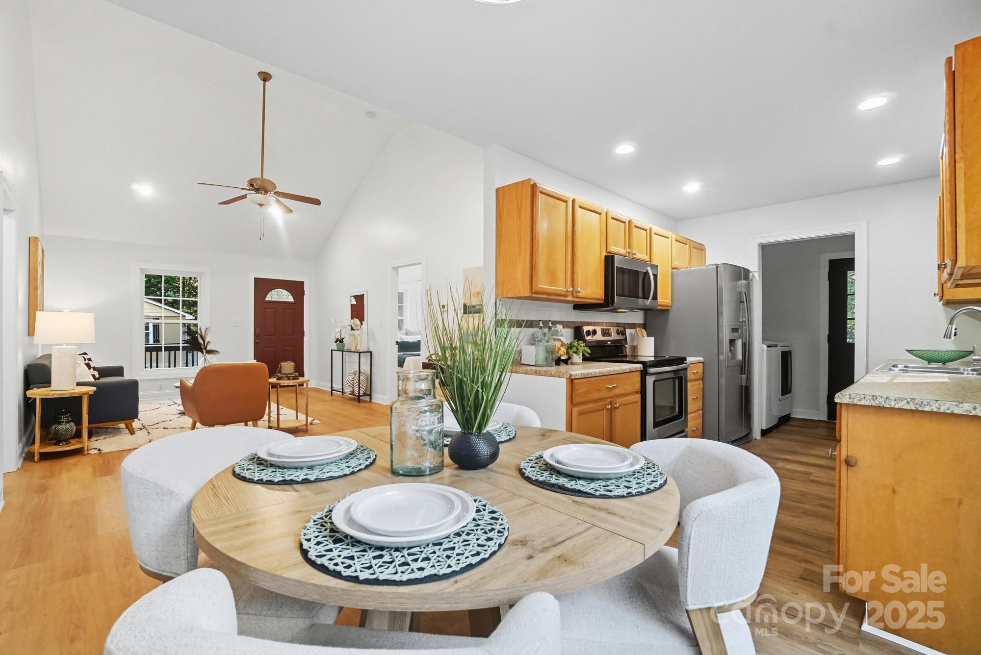 324 West Shiloh Unity Road Lancaster, SC 29720 - Photo 8 of 28 a dining room with furniture a dining table and kitchen view