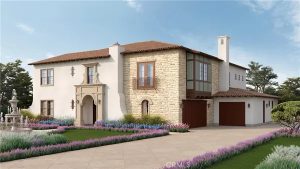 a front view of a house with a garden and plants