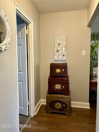 a view of a livingroom with wooden floor