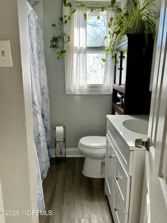 a view of a bathroom with a sink and a toilet