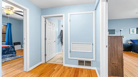 a view of a bedroom from a hallway