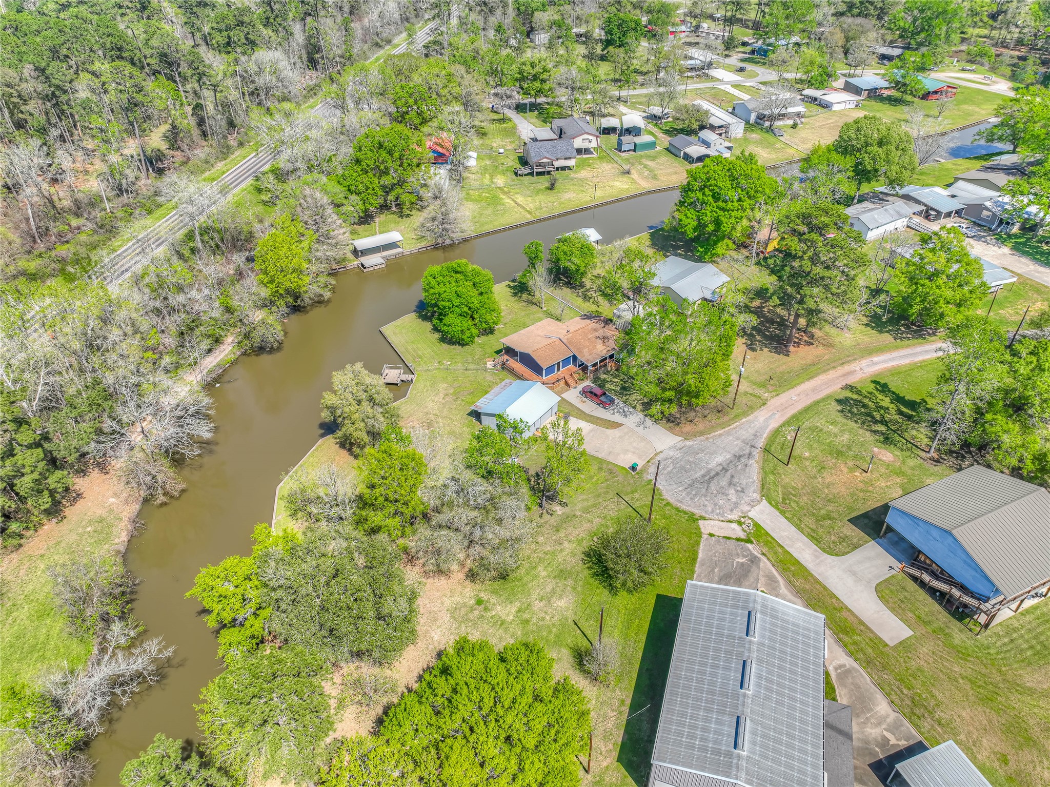 426 Deer Run Road Trinity, TX 75862 - Photo 15 of 18 a view of a yard with plants