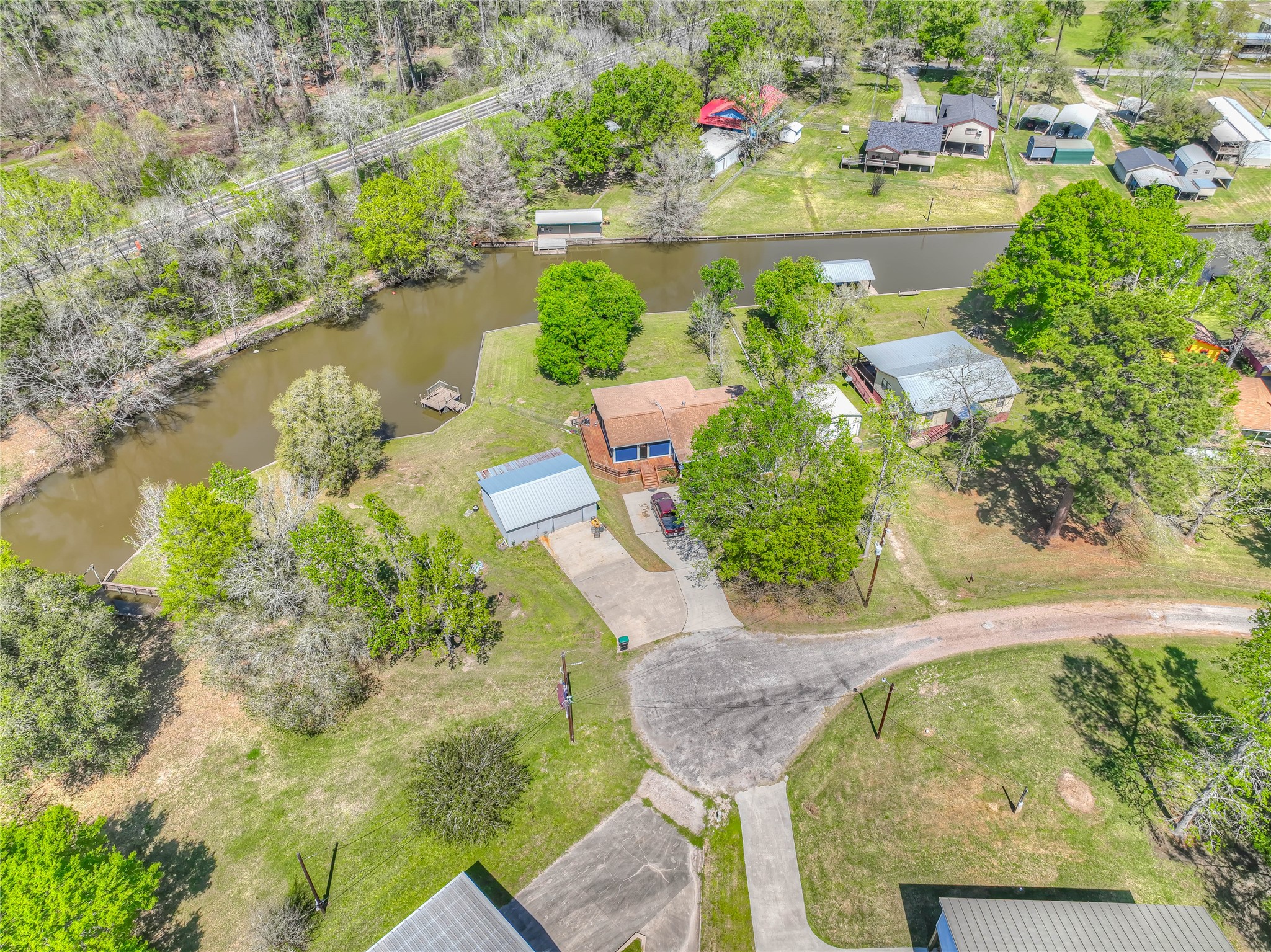 426 Deer Run Road Trinity, TX 75862 - Photo 18 of 18 a view of lake from a balcony