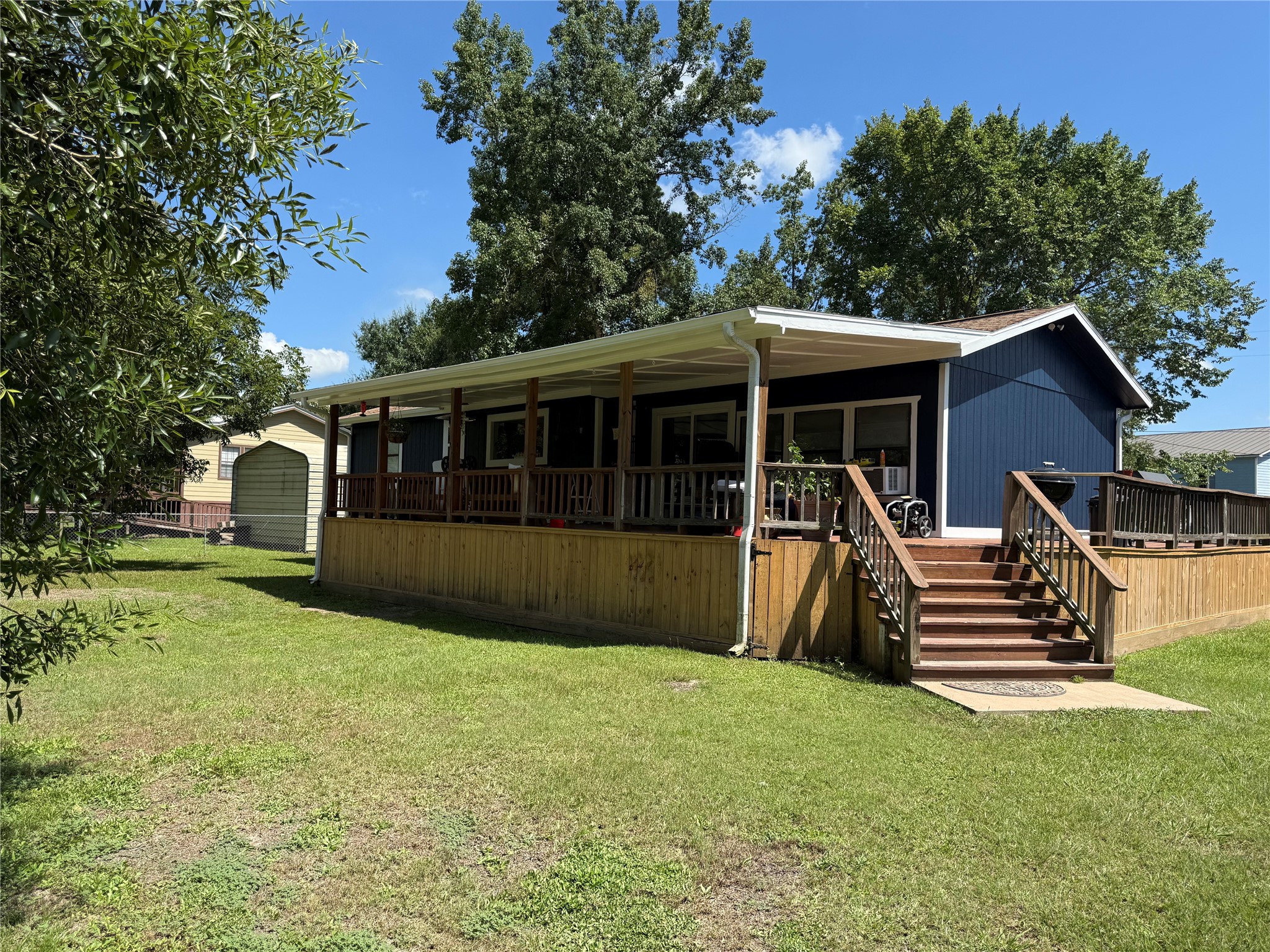 426 Deer Run Road Trinity, TX 75862 - Photo 5 of 18 a view of house with a yard
