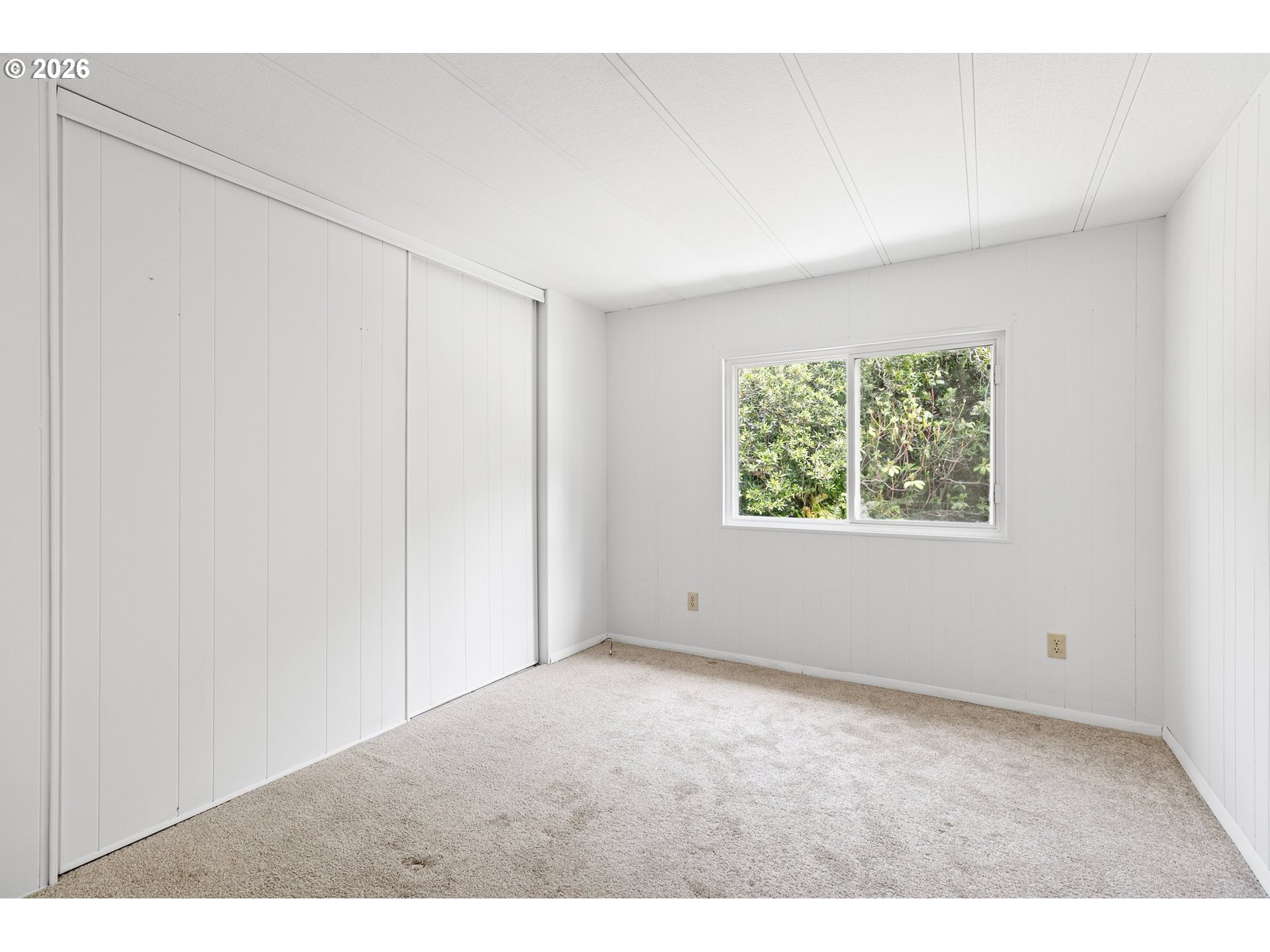 1600 Rhododendron Drive, Unit 429 Florence, OR 97439 - Photo 19 of 47 an empty room with a window