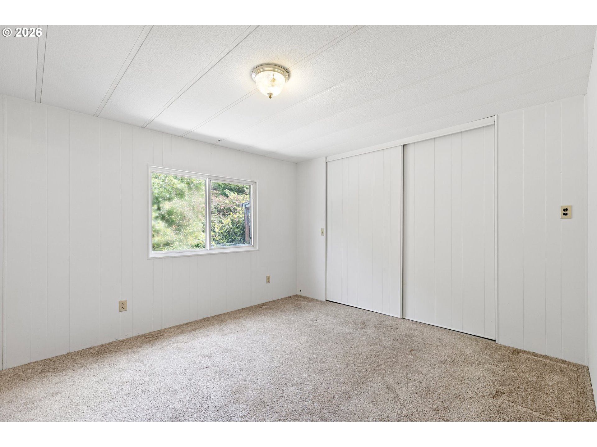 1600 Rhododendron Drive, Unit 429 Florence, OR 97439 - Photo 23 of 47 a view of an empty room with a window