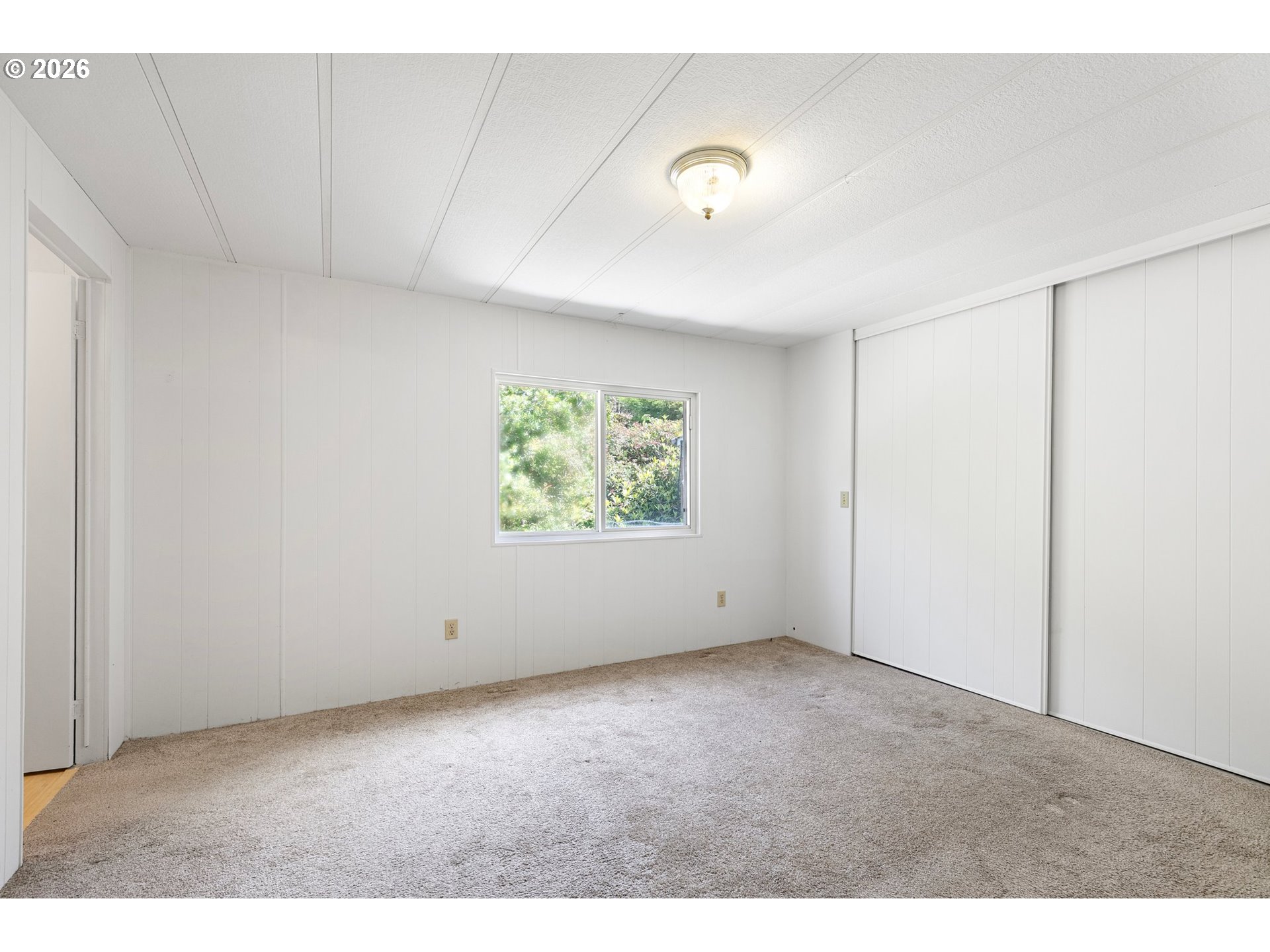 1600 Rhododendron Drive, Unit 429 Florence, OR 97439 - Photo 24 of 47 a view of an empty room with a window