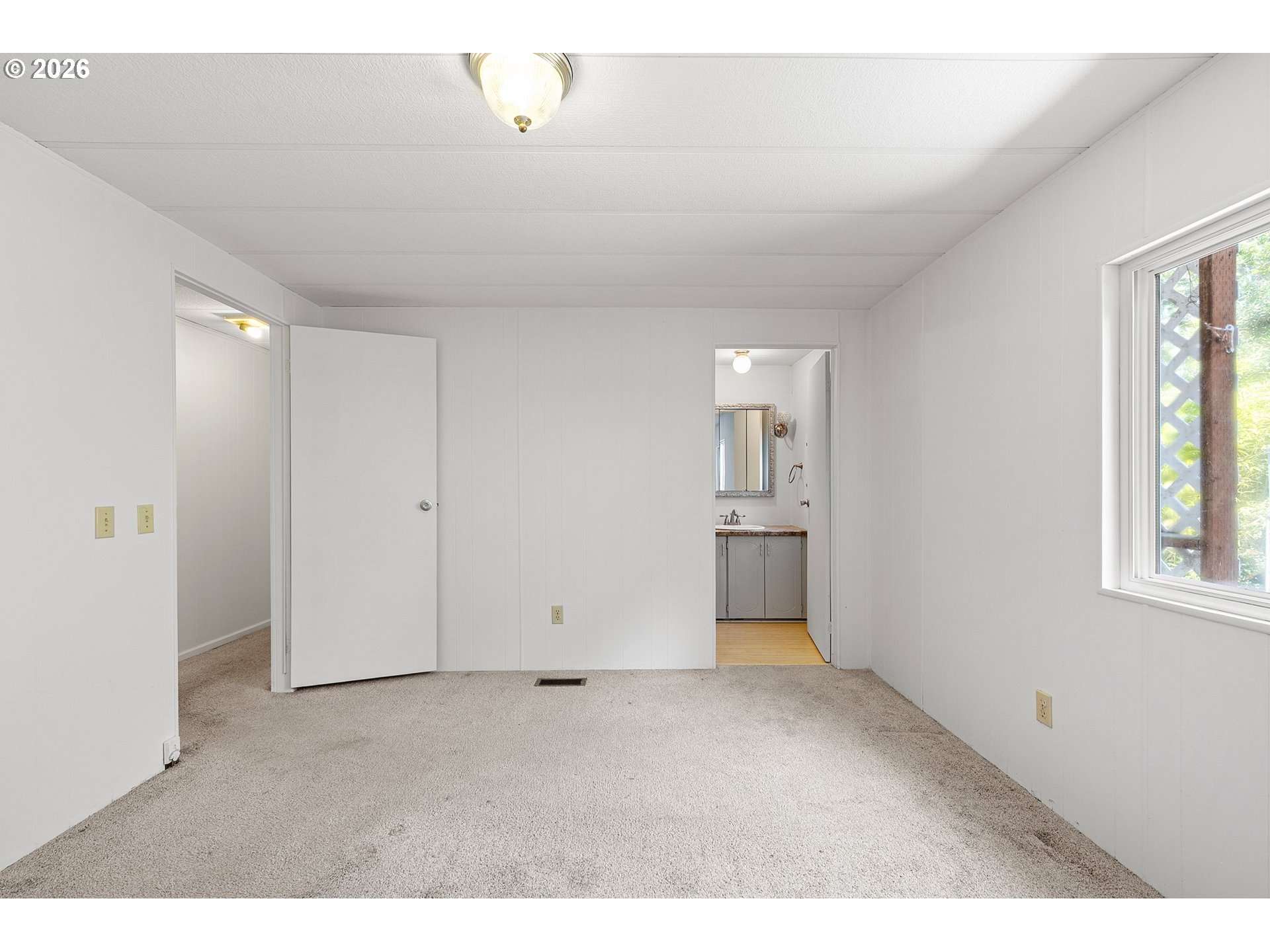 1600 Rhododendron Drive, Unit 429 Florence, OR 97439 - Photo 26 of 47 a view of an empty room with a window