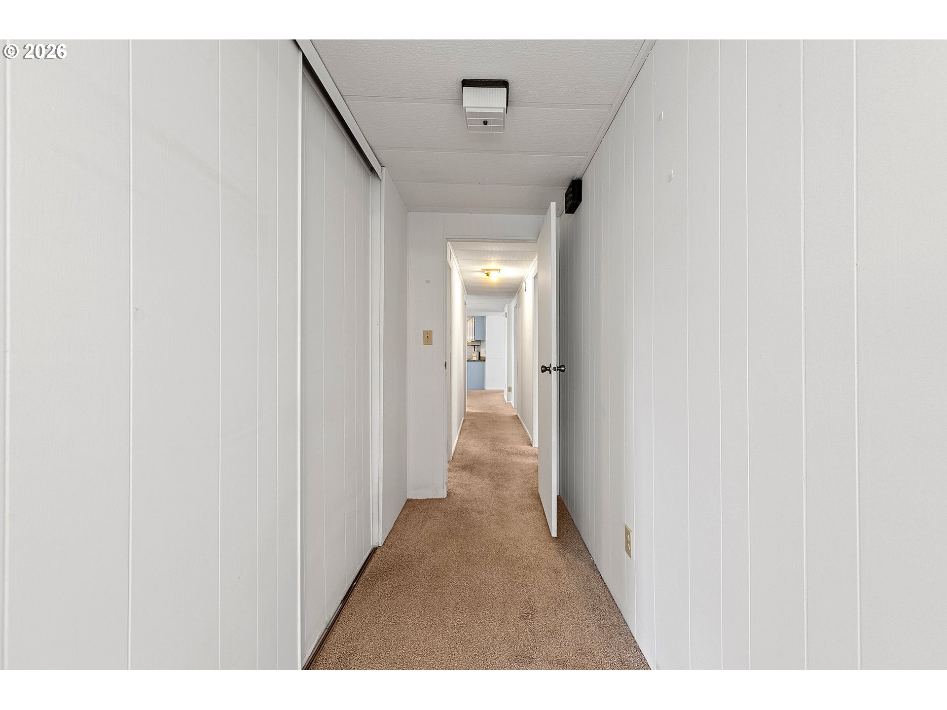 1600 Rhododendron Drive, Unit 429 Florence, OR 97439 - Photo 32 of 47 a view of a hallway with wooden floor and entryway