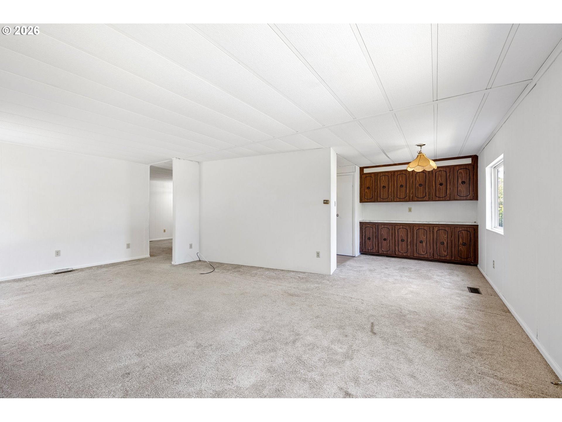 1600 Rhododendron Drive, Unit 429 Florence, OR 97439 - Photo 5 of 47 a view of empty room with a fireplace