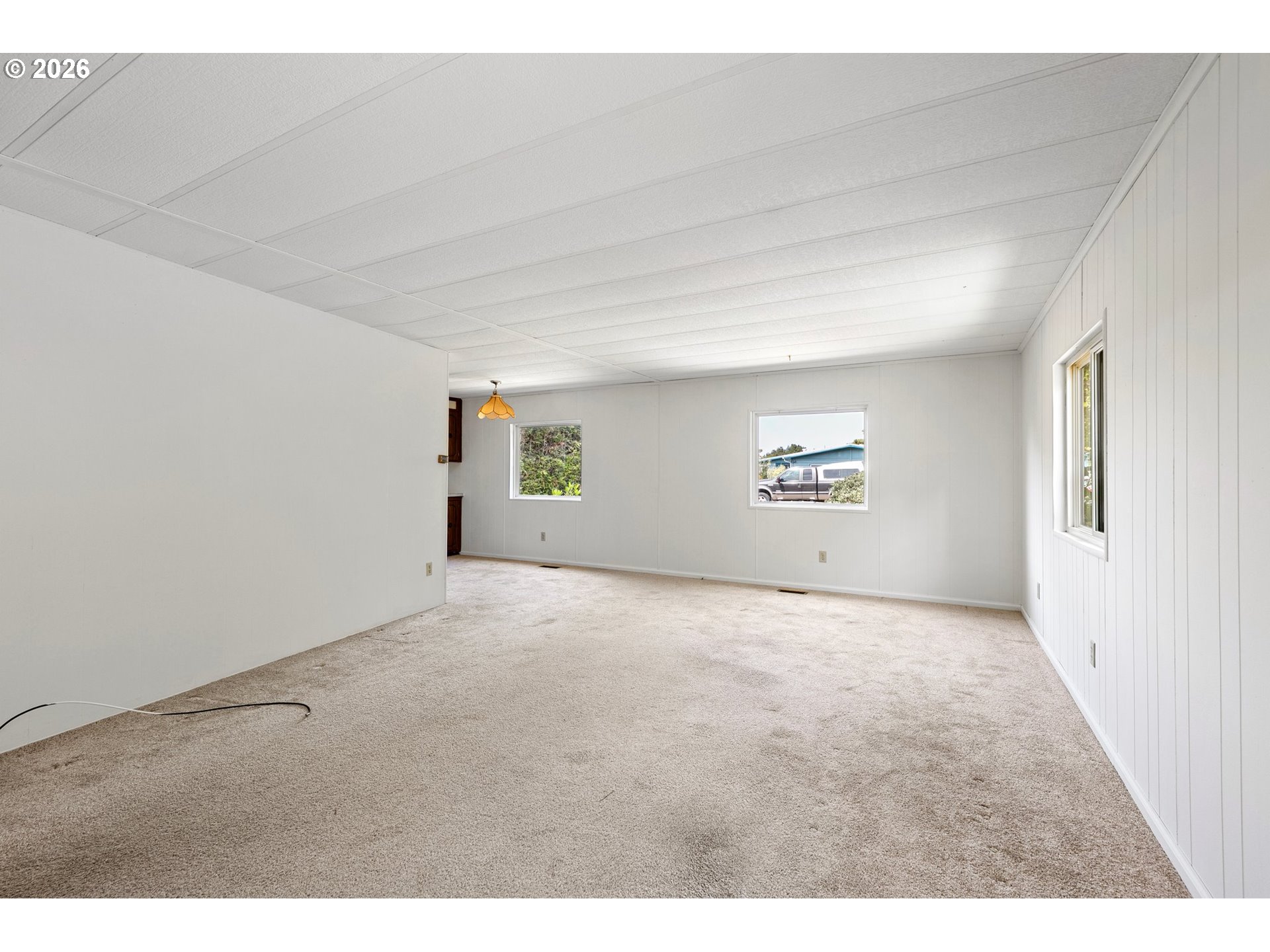 1600 Rhododendron Drive, Unit 429 Florence, OR 97439 - Photo 6 of 47 a view of an empty room with a window