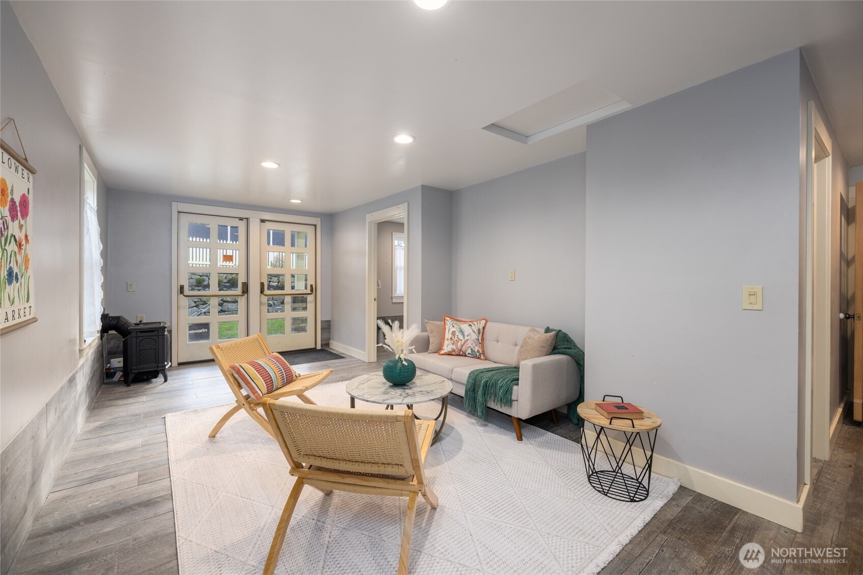 303 Benton Street La Conner, WA 98257 - Photo 20 of 40 a living room with furniture and wooden floor