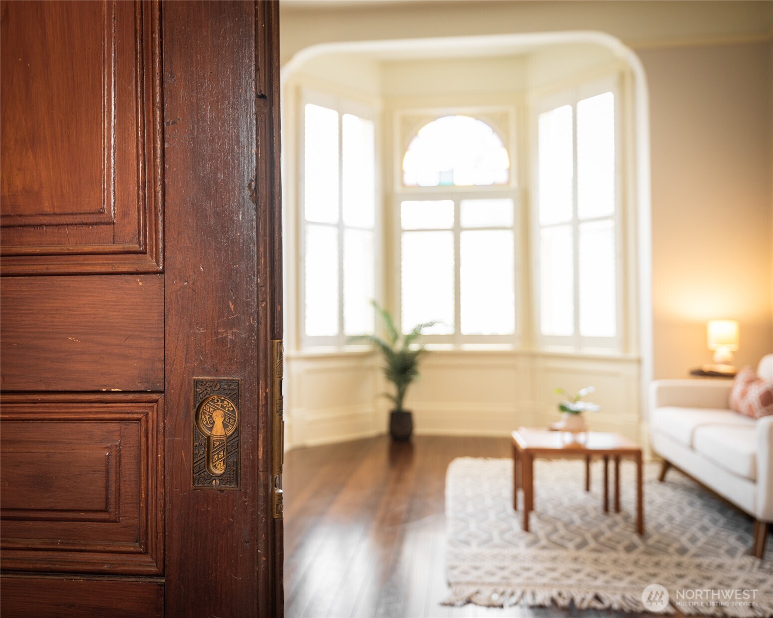 303 Benton Street La Conner, WA 98257 - Photo 25 of 40 a living room with furniture and a window