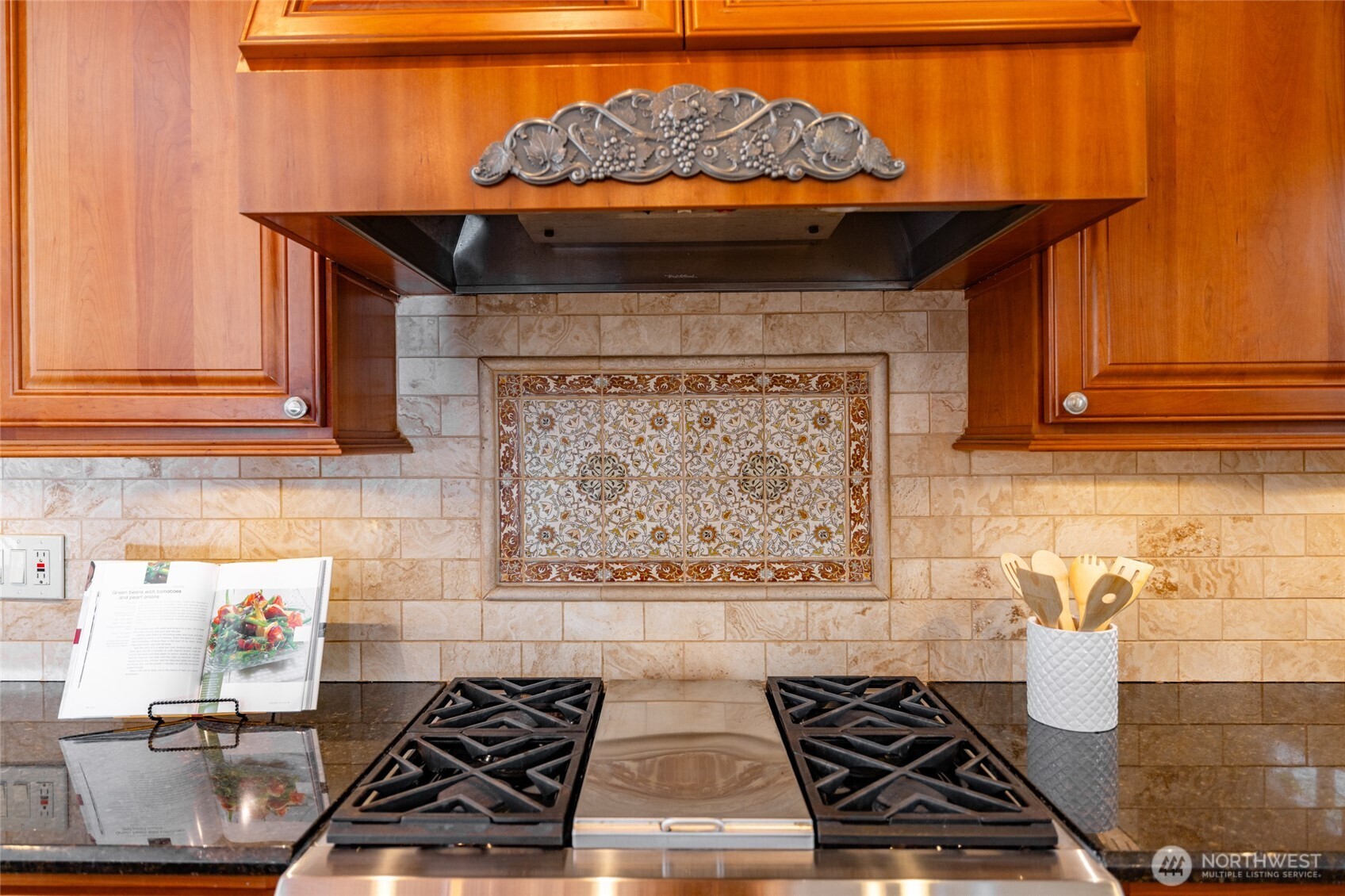 303 Benton Street La Conner, WA 98257 - Photo 30 of 40 a stove top oven sitting inside of a kitchen