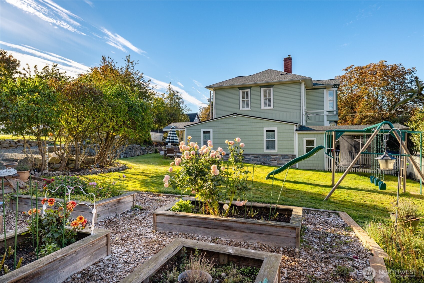 303 Benton Street La Conner, WA 98257 - Photo 34 of 40 a view of a house with backyard