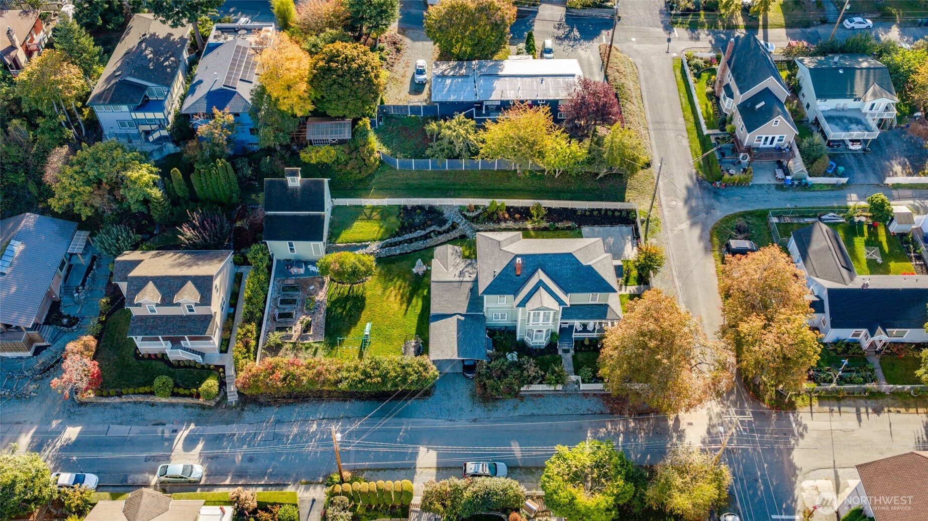 303 Benton Street La Conner, WA 98257 - Photo 36 of 40 an aerial view of multiple houses with a yard
