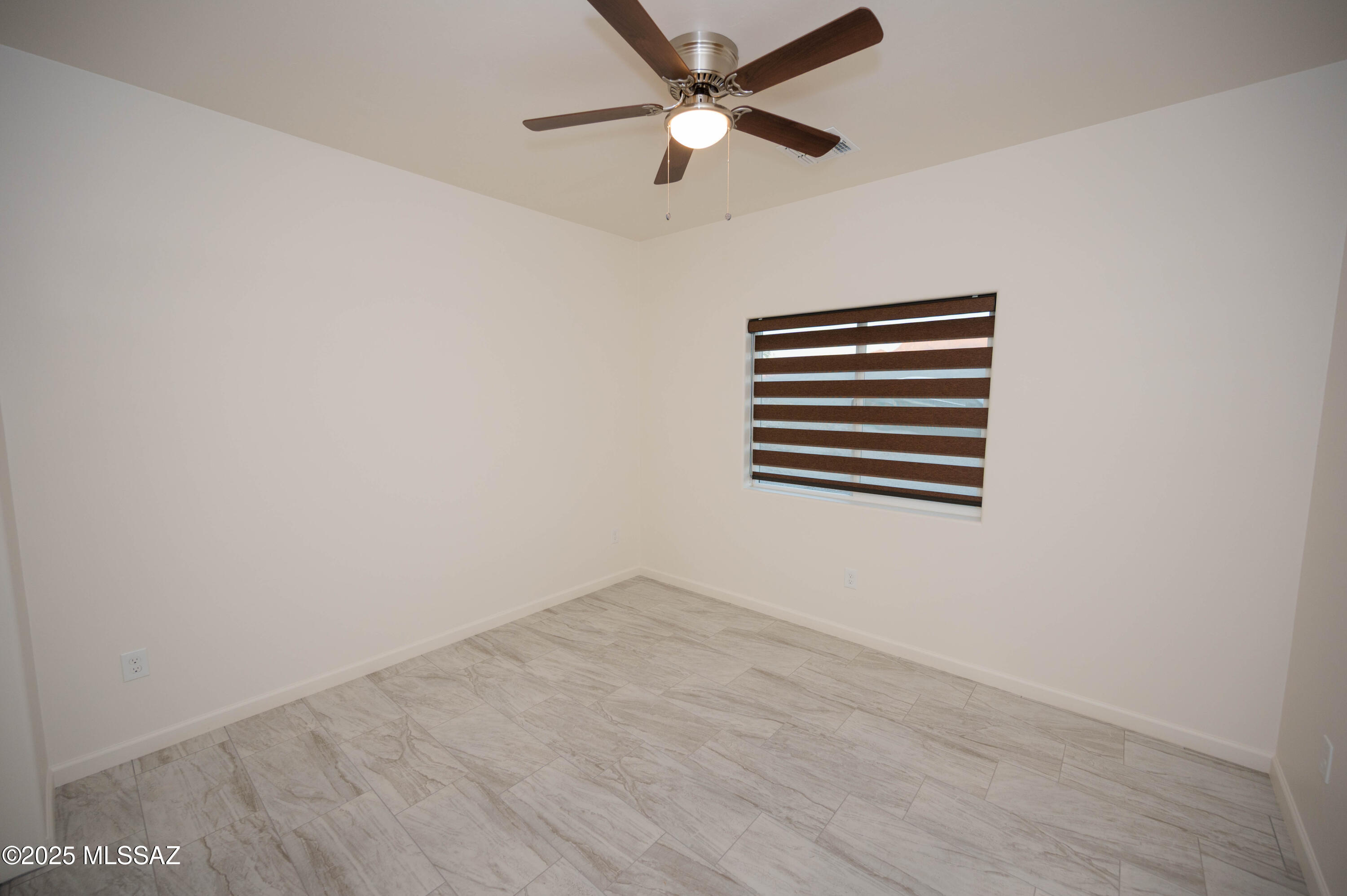 497 Calle Cipres Rio Rico, AZ 85648 - Photo 29 of 50 a view of empty room with ceiling fan