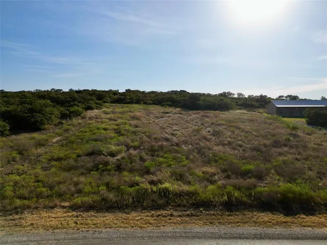 a view of a lake with a mountain