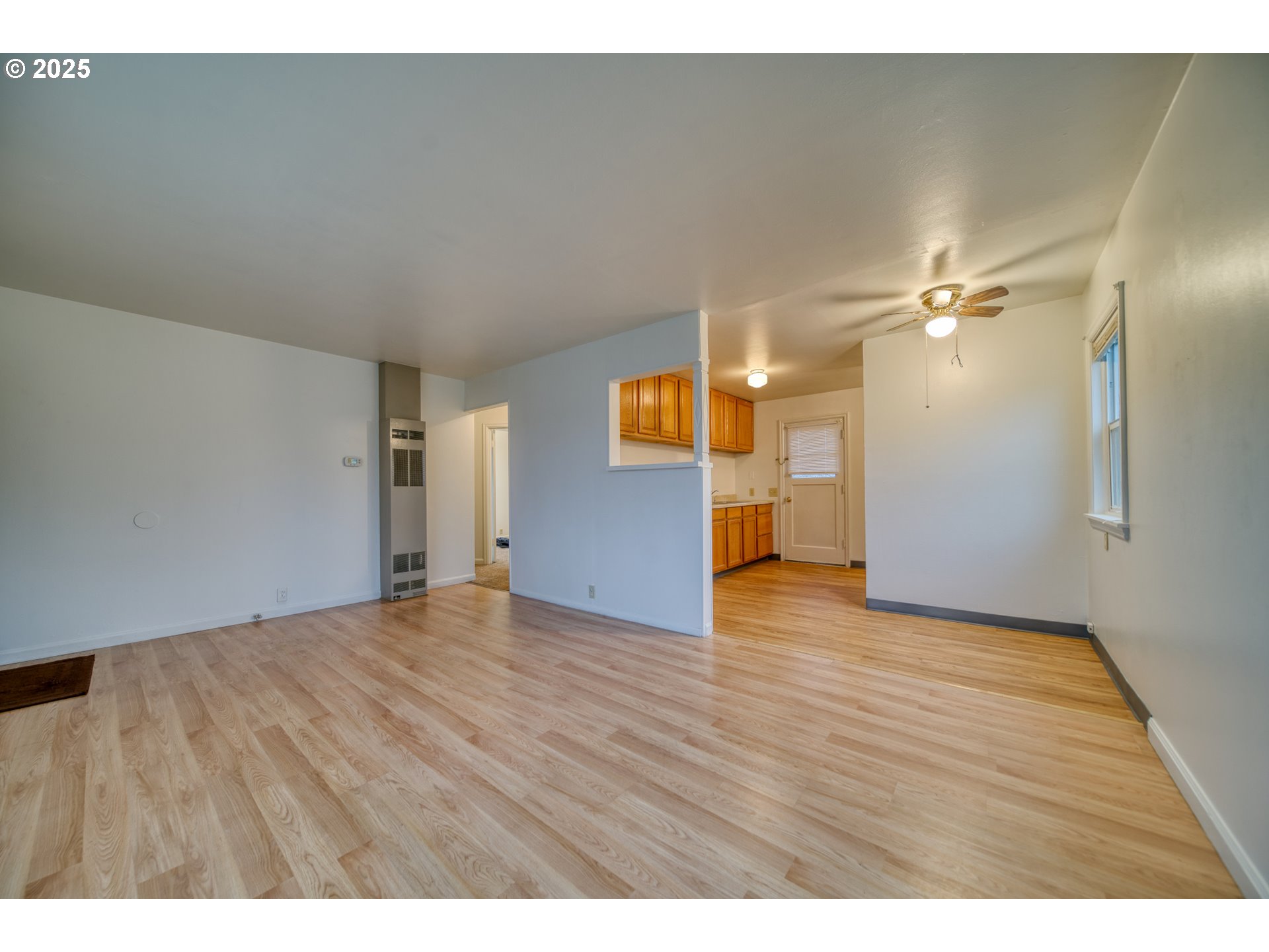 1924 Tualatin Street St. Helens, OR 97051 - Photo 15 of 27 a view of an empty room and wooden floor