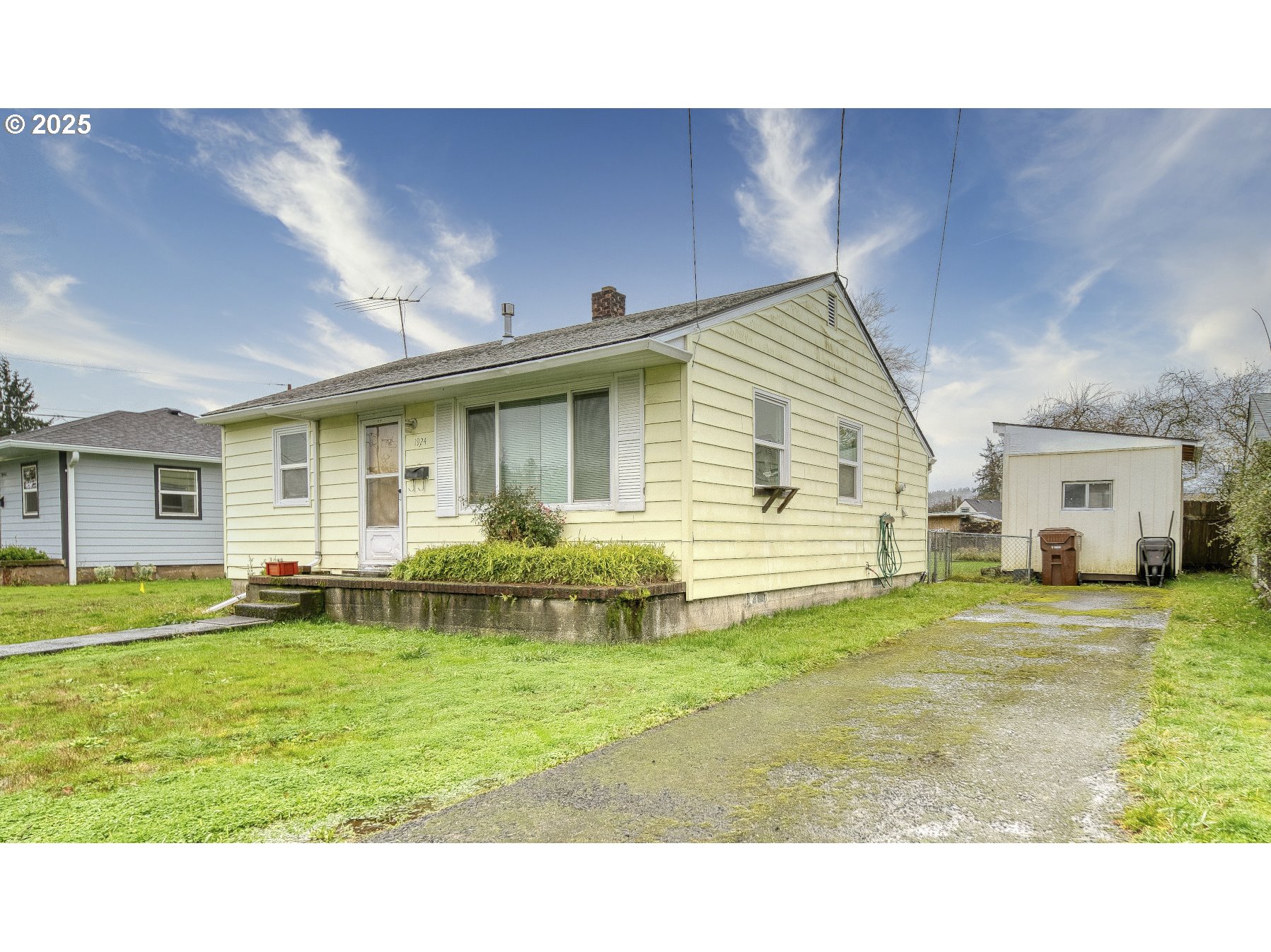 1924 Tualatin Street St. Helens, OR 97051 - Photo 2 of 27 a backyard of a house with table and chairs