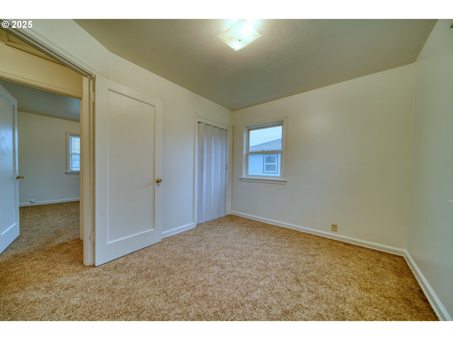 1924 Tualatin Street St. Helens, OR 97051 - Photo 23 of 27 a view of an empty room and window